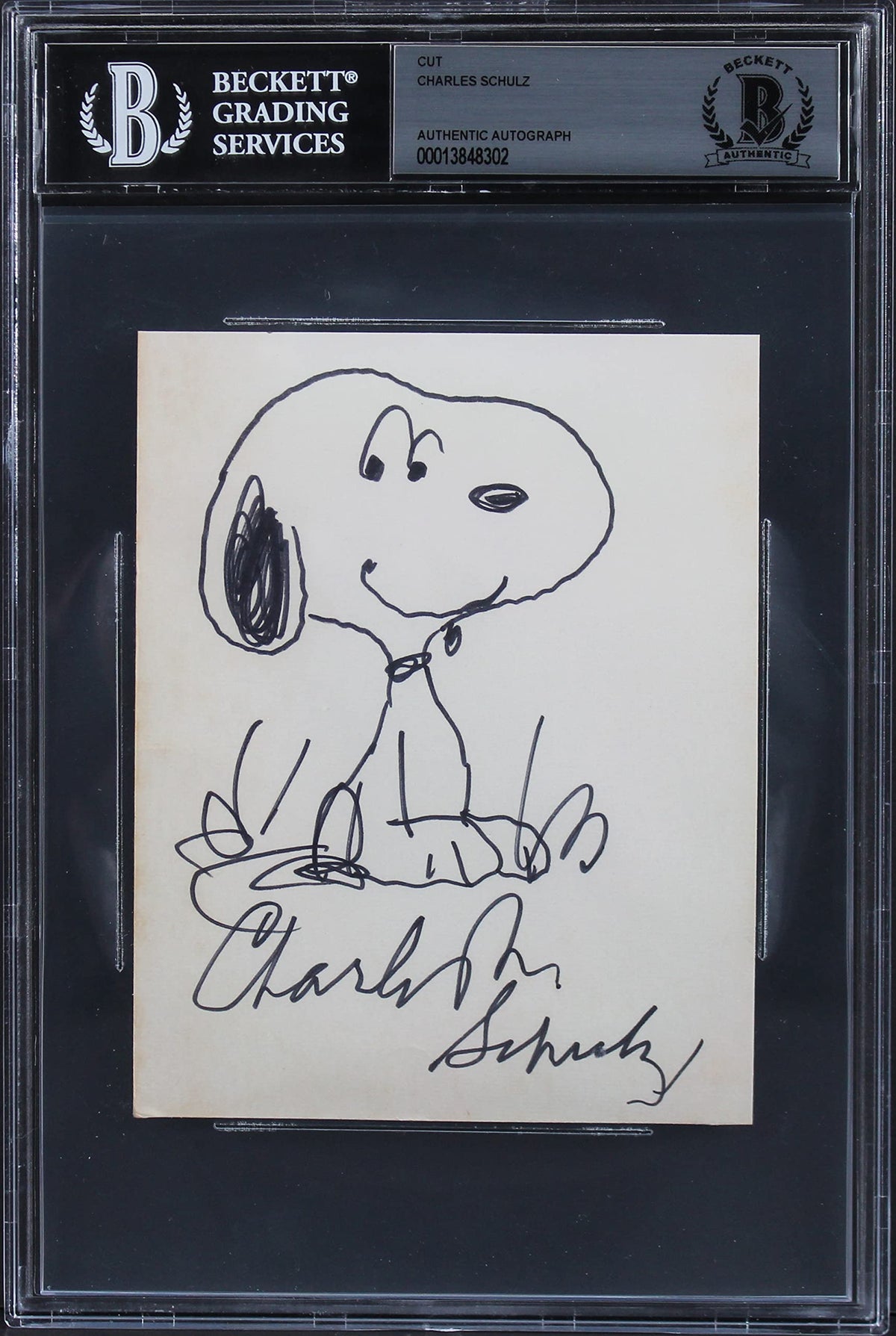 Charles Schulz Peanuts Signed 4x5.35 Cut Signature w/ Snoopy Sketch BAS Slabbed