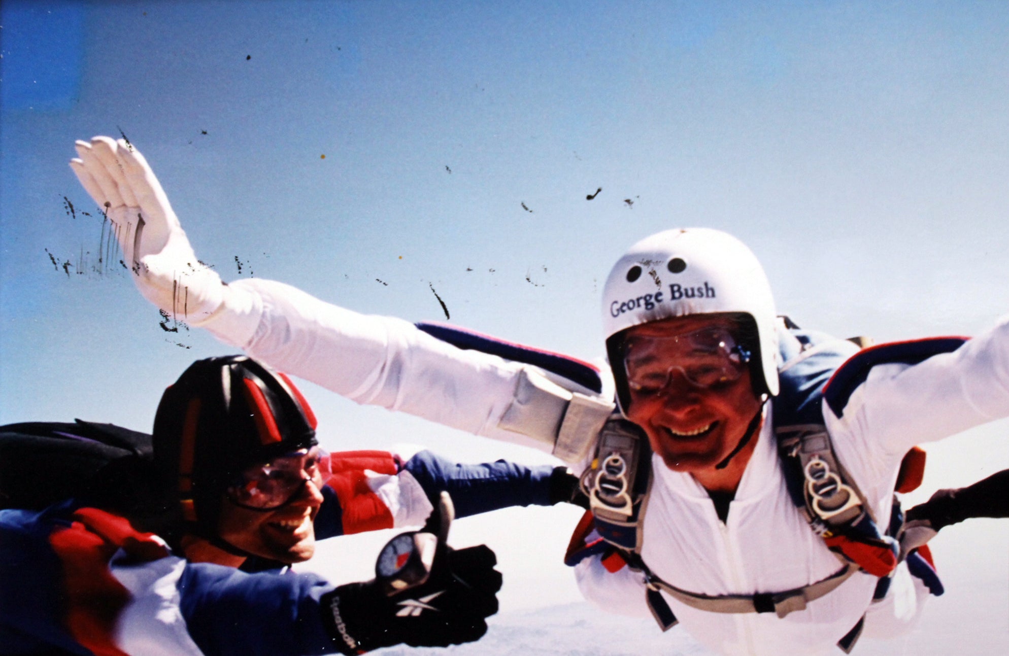 George H.W. Bush Signed & Matted 85th Birthday Skydiving 8x12 Photo BAS #A84998