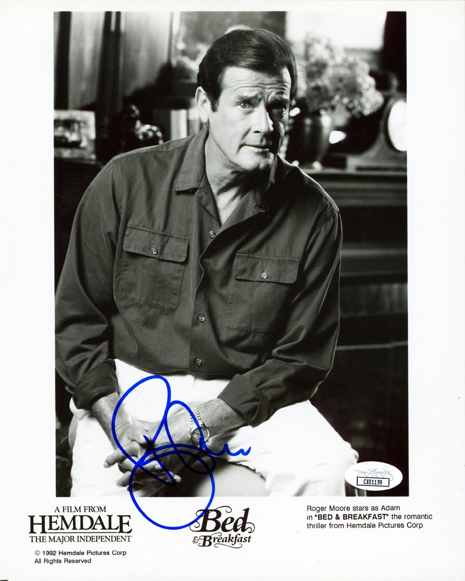 Roger Moore Bed & Breakfast Authentic Signed 8x10 Vertical Photo JSA #CE01159
